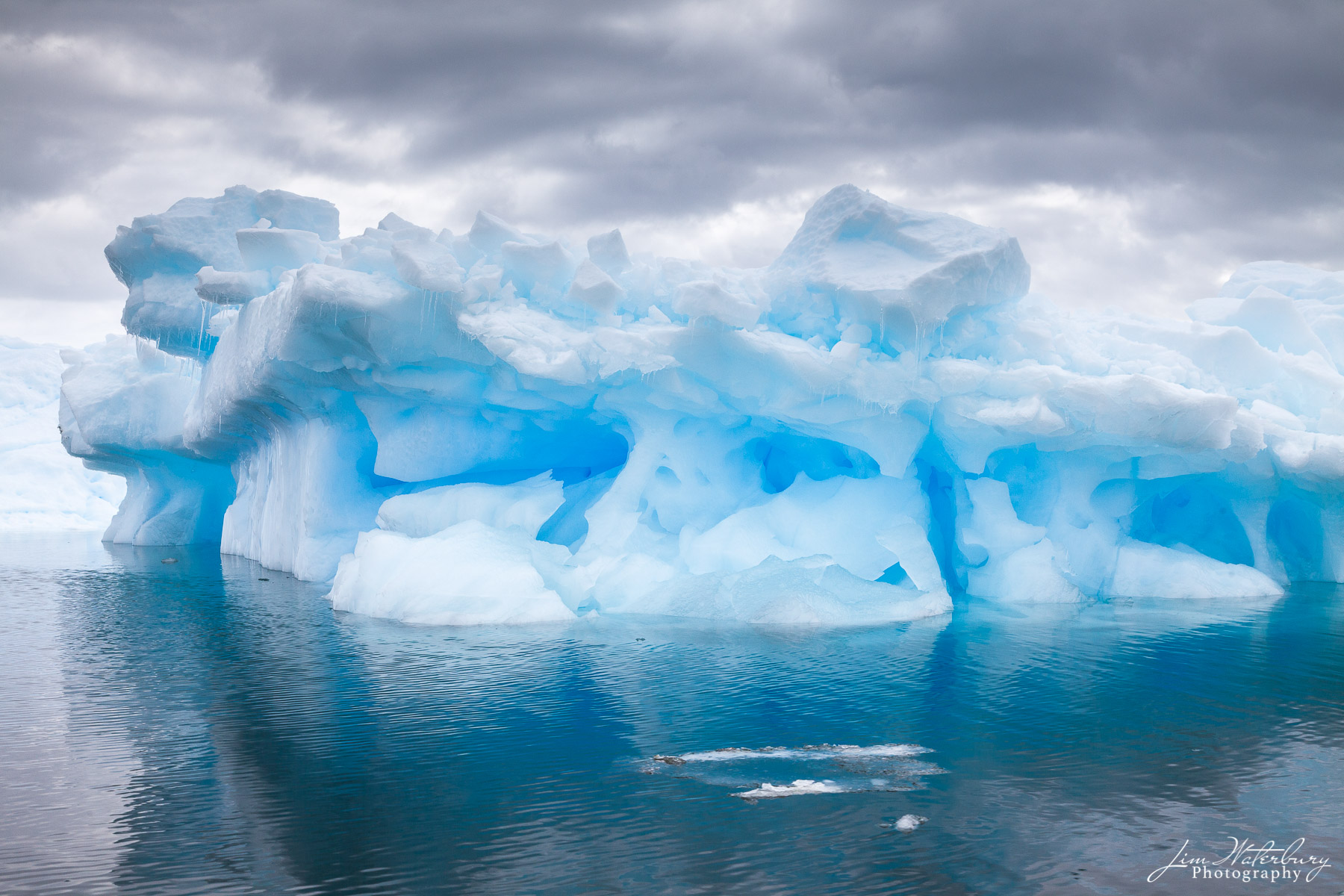 Ice Island Iceberg and reflections in the Lemaire Channel -- a study in shades of blue.