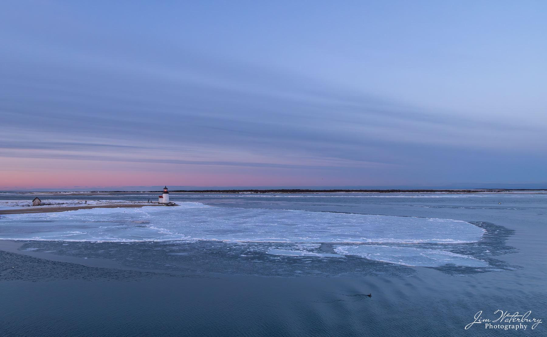 Protected by Ice Ice extends out from Brant Point along the edge of the channel to Nantucket Harbor.