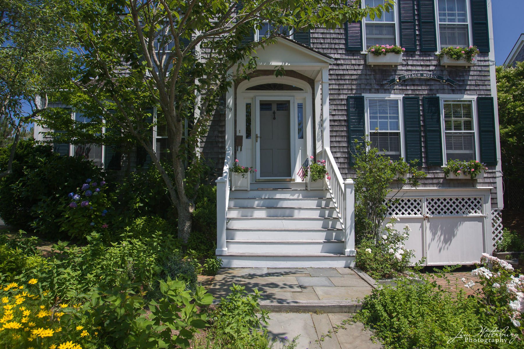 Beach Music This magnificent house, on Hulbert Avenue in Nantucket, as with many of the historic homes on Nantucket, has weathered, gray...