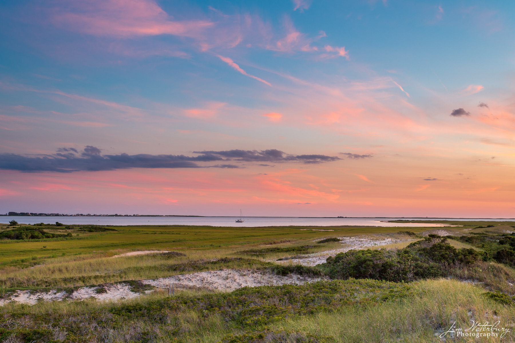 Late Summer Night A late summer sunset reflects pink light into the clouds over Nantucket Sound, as seen from atop the sand dunes on Eel Point.