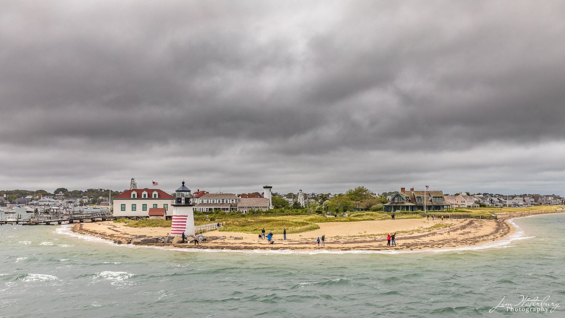 As the ferry rounds Brant Point Lighthouse, on a cold, windy and stormy September day, onlookers waive farewell ... until next...