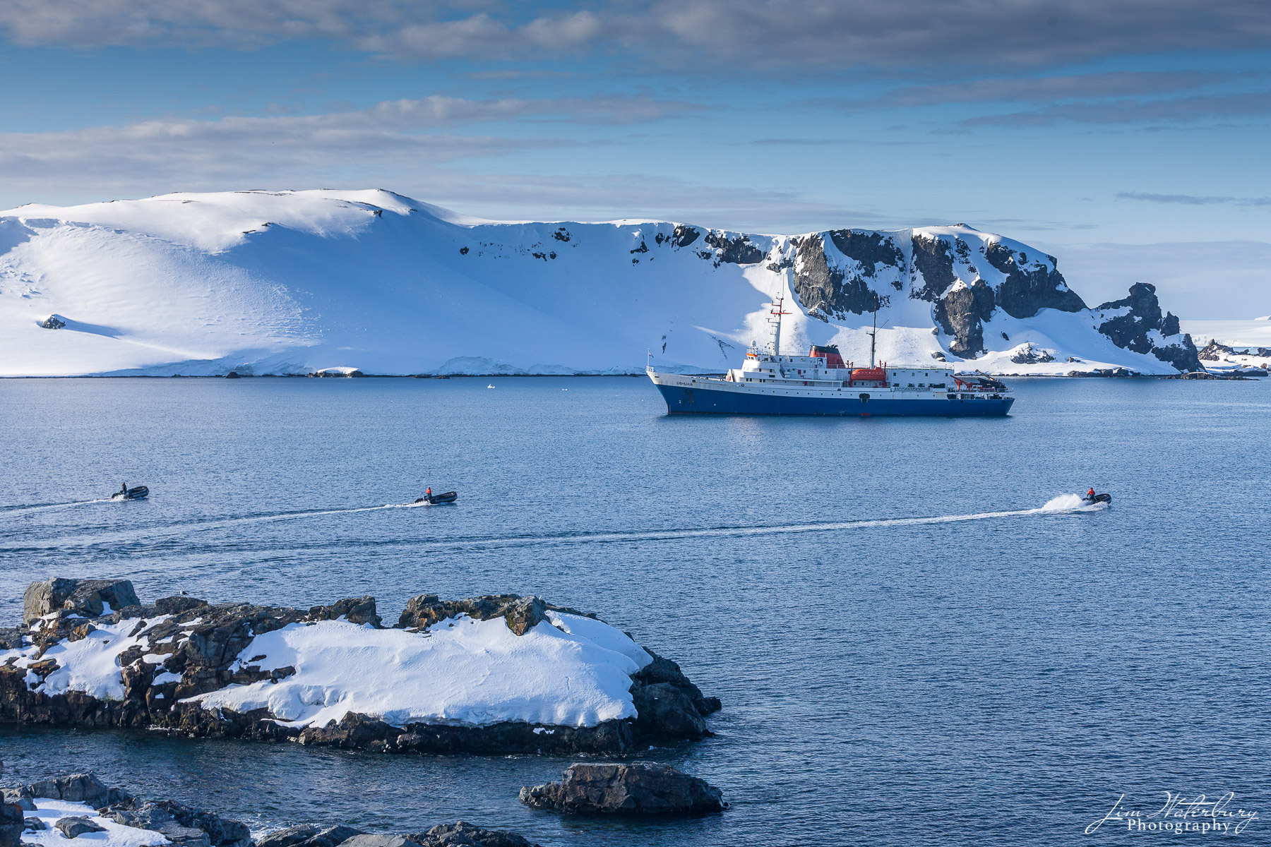 Boat Race Three zodiacs race back to the mother ship -- the Ushuaia -- in the waters near Half Moon Island, at the top of the Antarctic...