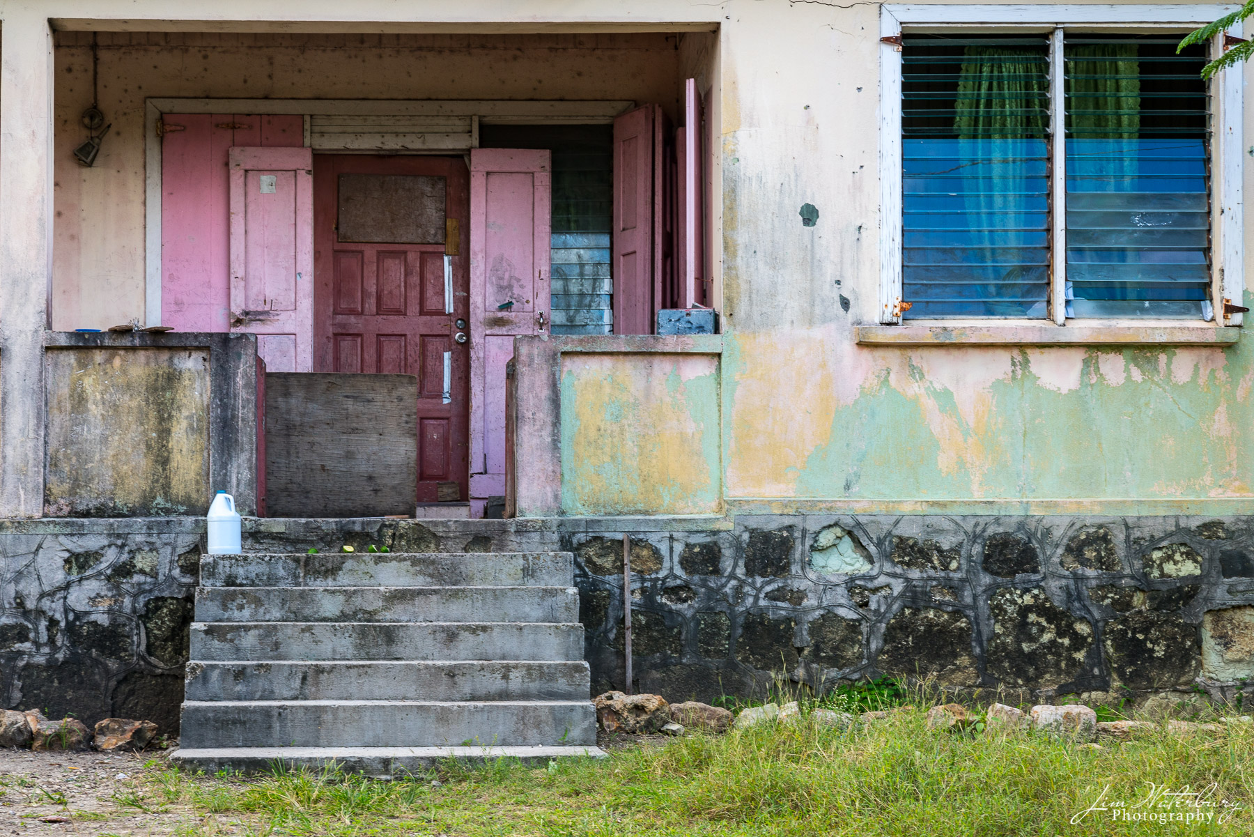 Shades of Pink House in a local neighborhood of the island of Antigua.