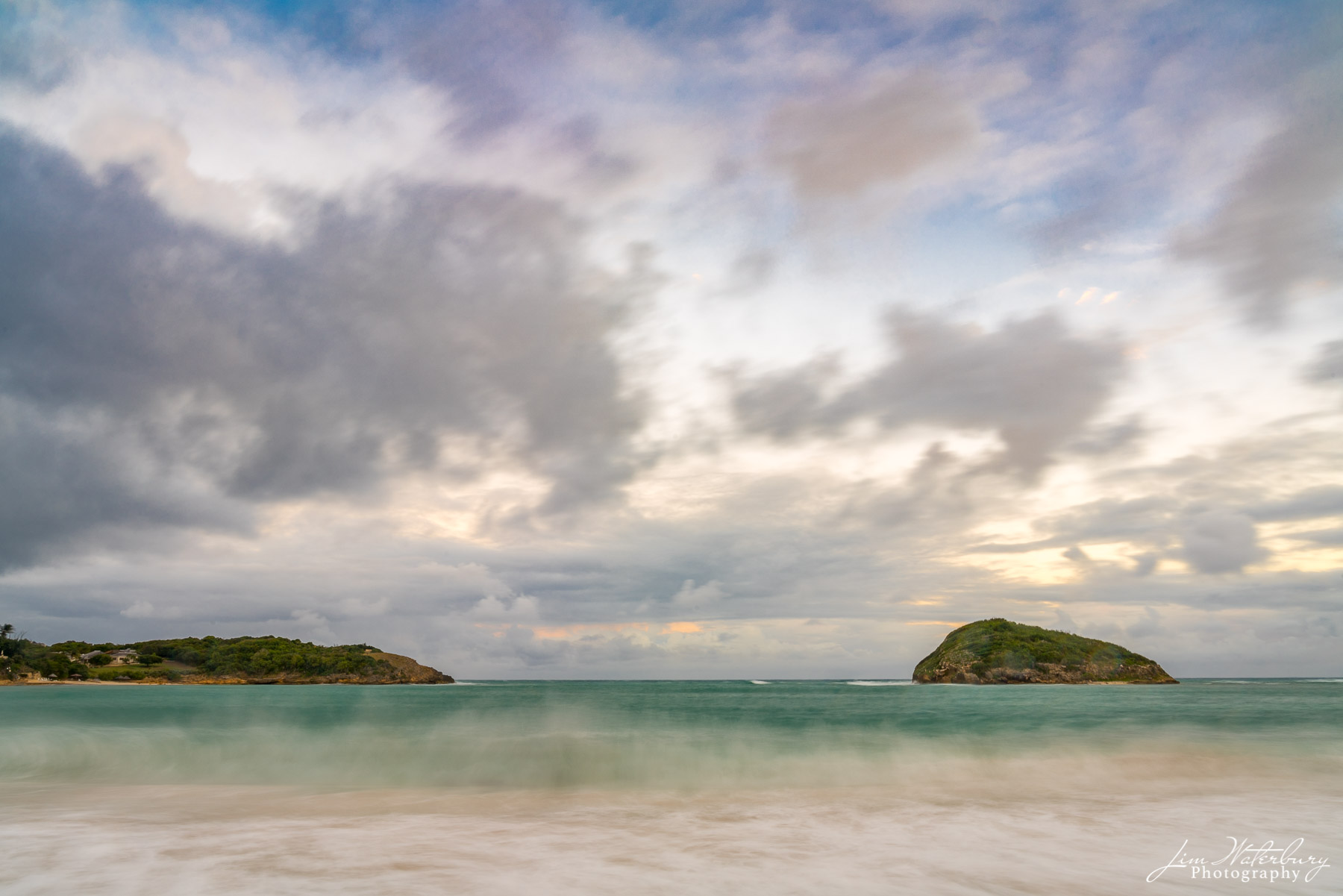 Painterly Skies View of Smith Island and Exchange Bay, Antigua against a moody Carribean sky.