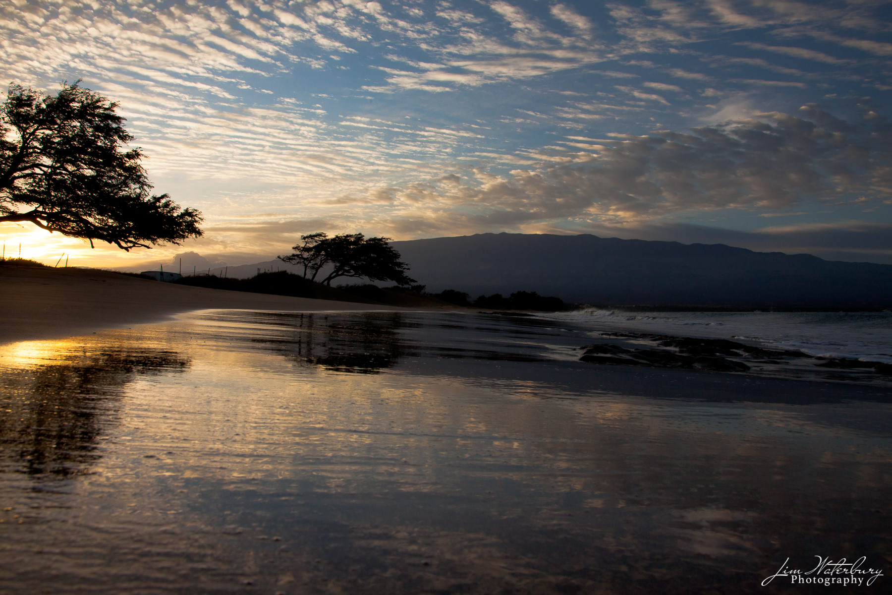 A New Day A new day dawns, just after sunrise along the bay by the Kealia Bird Sanctuary on the island of Maui.