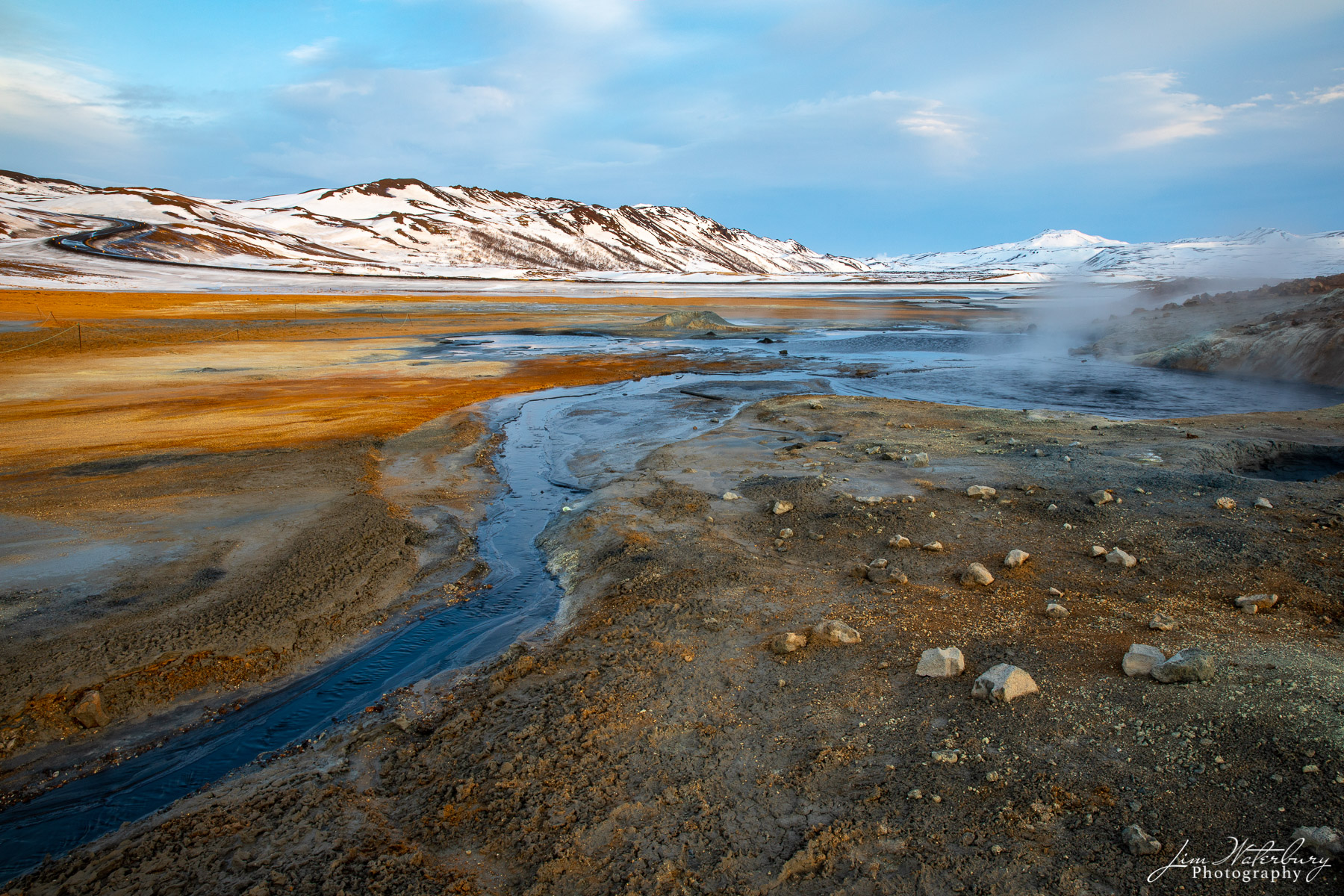 Fields of Gold Gold and blue colors cover the winter ground at the Namaskard geothermal area in Iceland.