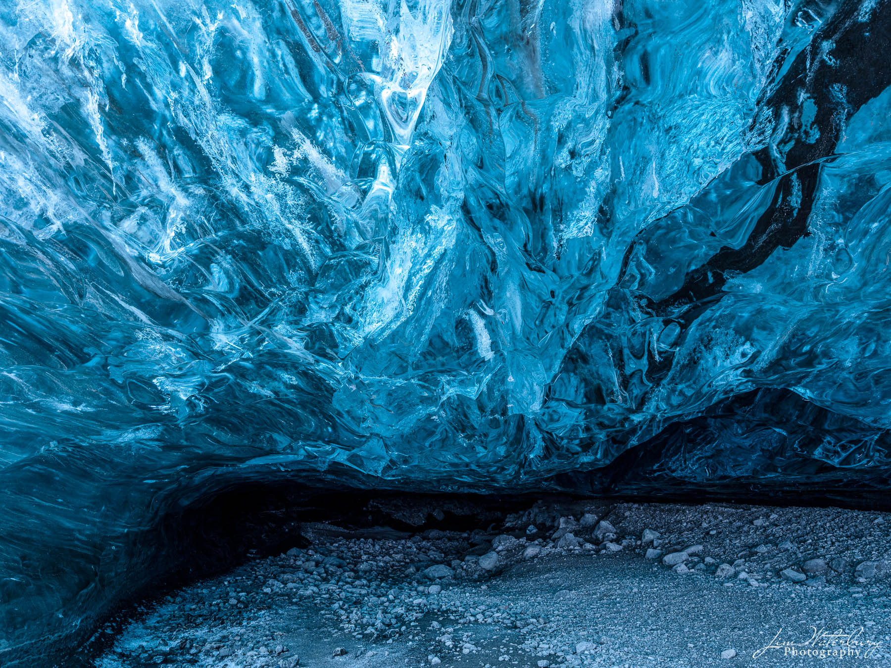 Blue ice at the entrance to an ice cave in the Breidarmerkurjokull outlet glacier (Vatnajokull), Iceland in winter.