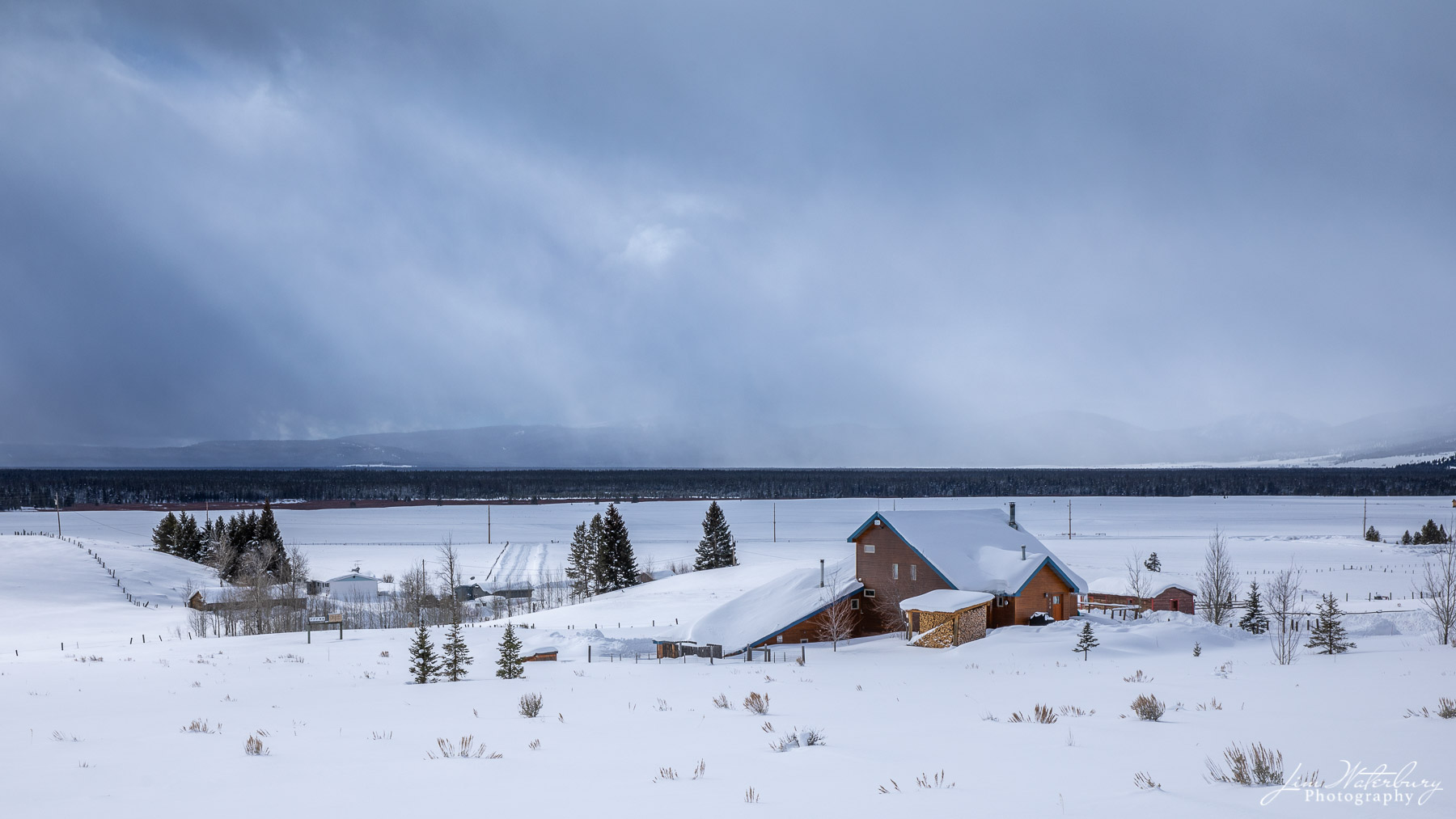 Yellowstone Clearing Storm Farm outside West Yellowstone as a winter snowstorm begins to clear.