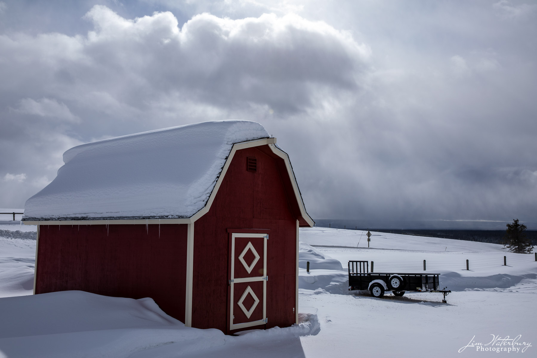 Farm outside West Yellowstone, as the sun starts to break through and the snow departs.