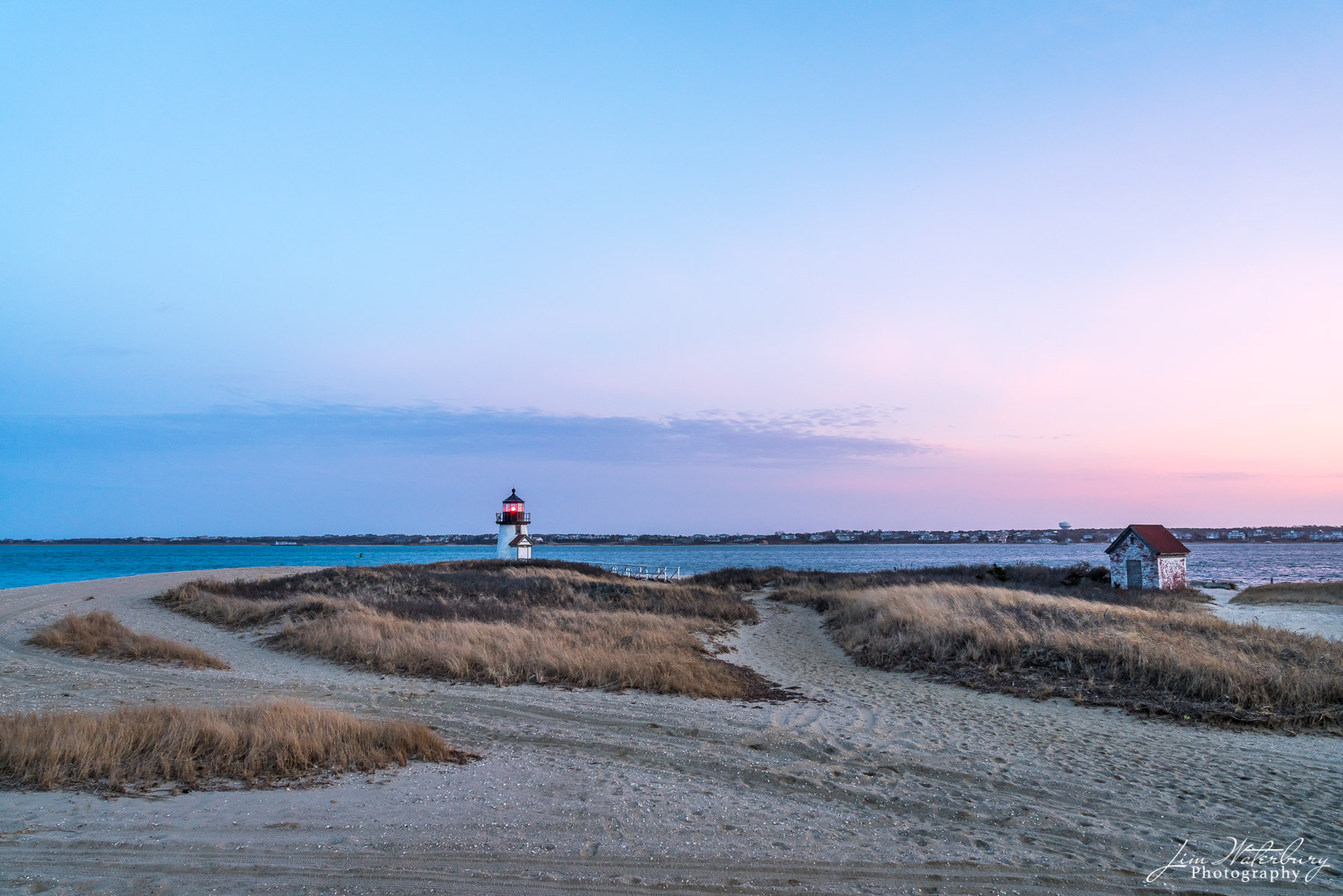 Brant Point lighthouse in the soft light of sunrise.