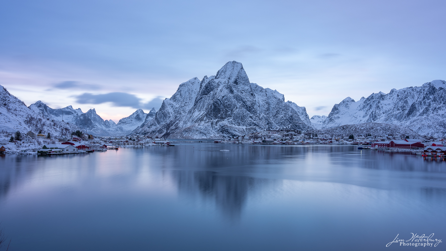 Blue Hour View of the village of Reine on a winter evening in the Lofoten Islands, Norway.