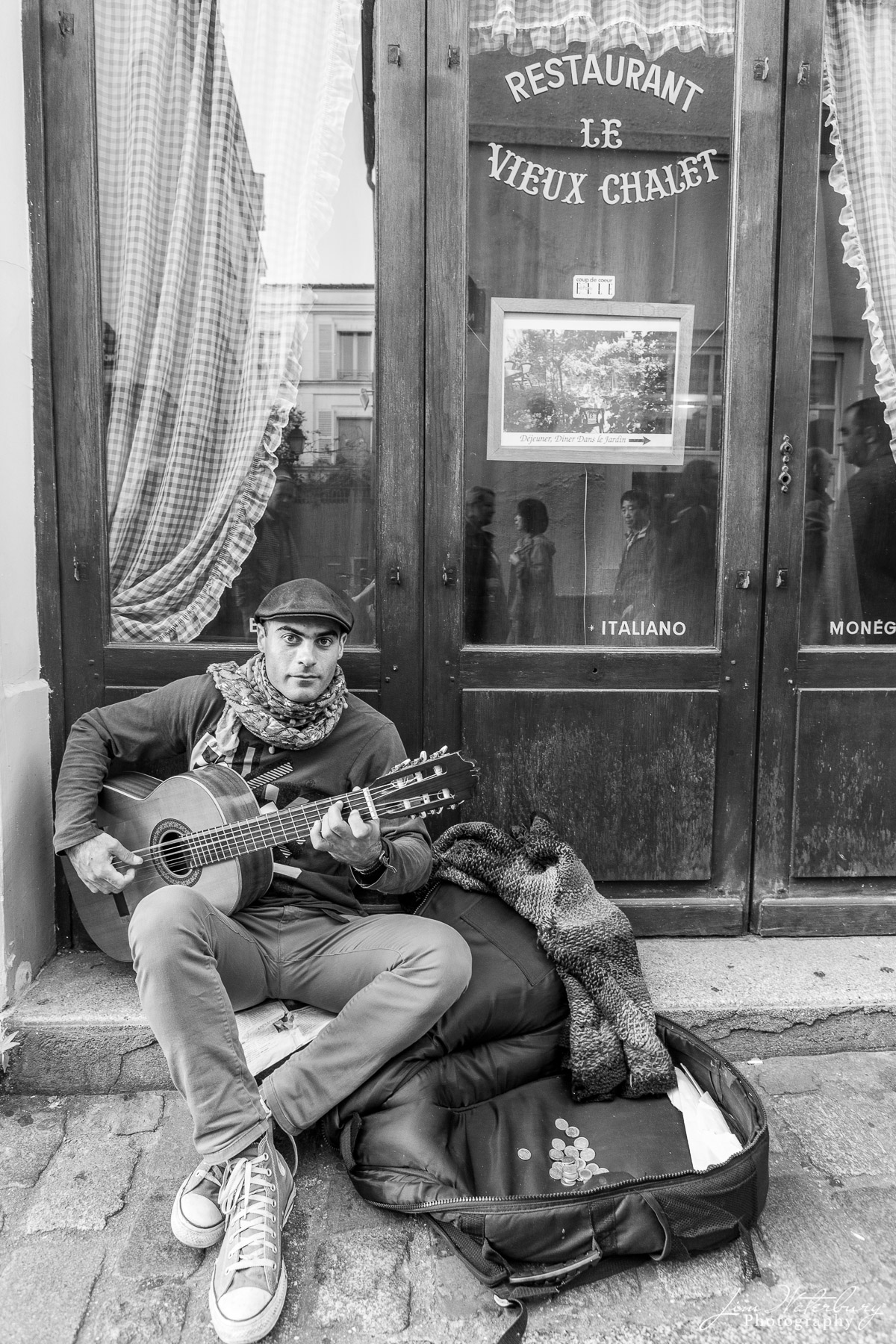 Singer working the sidewalks in Monmartre, Paris.