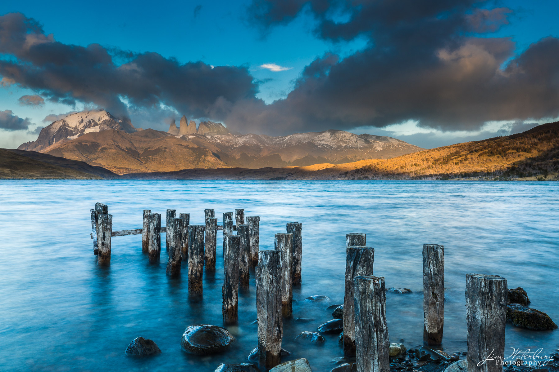 Remnants of an old pier in Lake Pehoe, looking back toward the mountains of Torres del Paine, Patagonia.