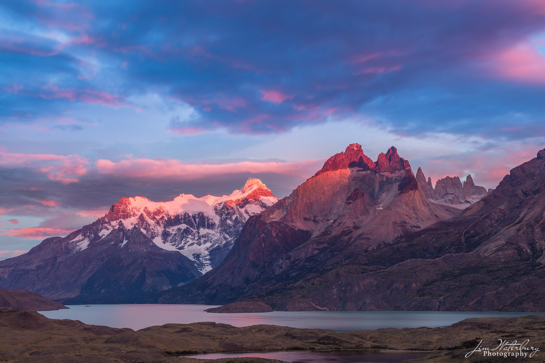 Sunrise over Cerro Torre Massif, Patagonia, reflected in Lago Torre, Los Glaciares National Park, Argentina